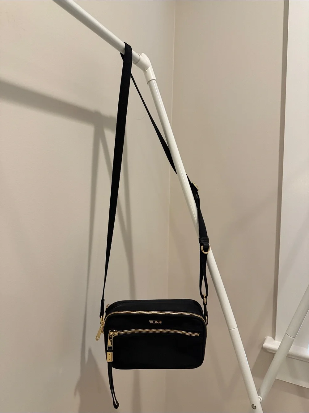 Tumi Black Crossbody Bag with Gold Hardware (camera bag style) Voyageur